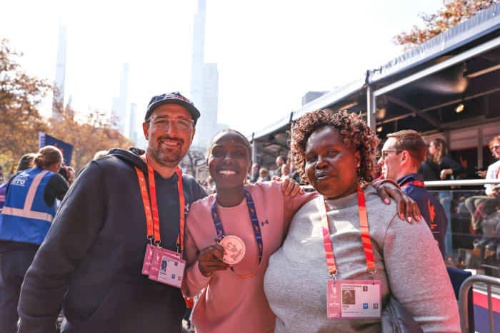 Sharon Lokedi smiles after the 2023 New York City Marathon.